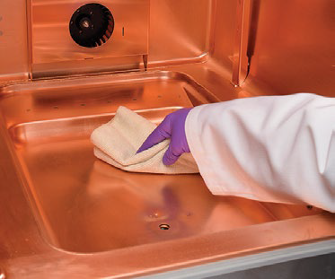 Cleaning the copper interior of a Forma Steri-Cycle incubator